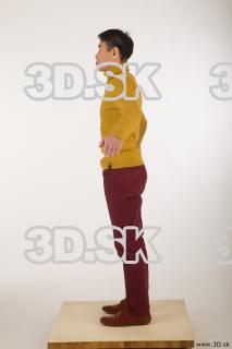 Whole body yellow sweater red trousers brown shoes of Sidney…